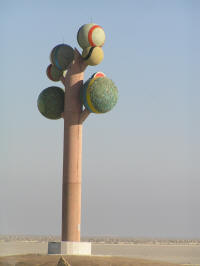 Ah, it's a giant metal baseball and avocado tree themed artwork.  Okay.