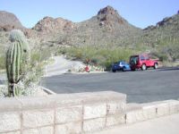 Blue Shoe and Evil Red Jeep near Gates Pass