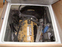 Looking at the engine under the bed.