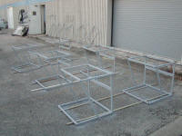 Welded tube frames being painted