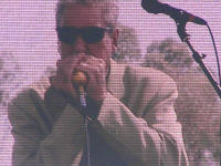 Rod Piazza blowing his harp