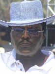 What Bernie Mac might look like in a blue hat and blue shades