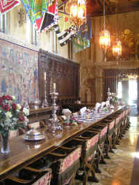 The grand dining room, with priceless tapestries all around