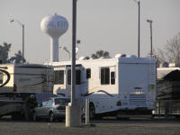 Our assigned spot was a rather utilitarian gravel pit surrounded by other high rollin' big rigs.