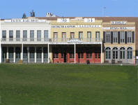 Historic row of semi-restored buildings.