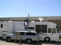 George's ole' blue Suburban came in handy in getting the panels onto the roof