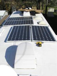The four 175 Watt solar panels arranged atop the RV so as to avoid being shadowed by the various protruburances