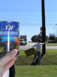 Always enthusiastic public servants, the beans stand watch while a citizen removes some debris someone left planted in the public right of way