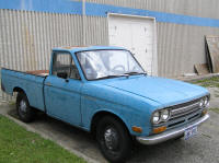 My Dad's pickup after the big hailstorm rendered it polka-dotted