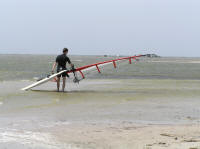 Carey heads out with the 4.6 sail on our first day windsurfing this year.