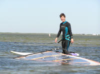 Debbie, all suited up and about to head out, in more reasonable conditions.