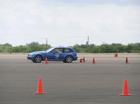 Hustling through the course with street tires howling in protest