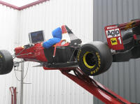 Baloo, sporting typical Belgian summer driving attire, tries out the new LCD screen